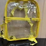 Clear See Threw Mini Back Pack With Adjustable Straps And Bottle Holder Yellow. Fixed Price $11.00.