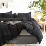 Luxury Black Duvet Cover 100% Cotton With Pom Detail And Matching Shams. Fixed Price $95.00.