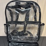 Clear See Threw Mini Back Pack With Adjustable Straps Bottle Holder Black. Fixed Price $10.00.