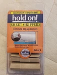 Hold On Sheet Grippers 4 Pieces Brand New In Package Sealed. Fixed Price $6.99.