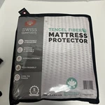 Swiss Comforts Twin Tencel Mattress Protector White Waterproof 39X75X14IN. Fixed Price $25.00.