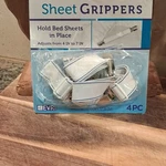 Evri Adjustable Bed Sheet Grippers White Pack 4-7IN Elastic Clips. Fixed Price $5.91.